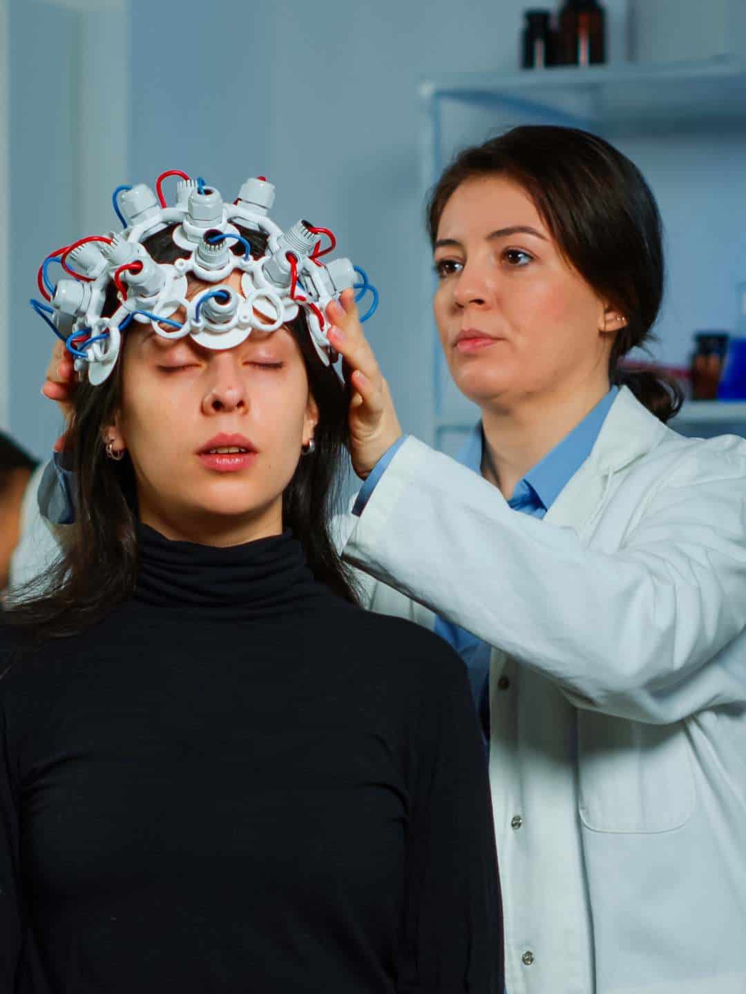 Female patient undergoing TMS in Portland.