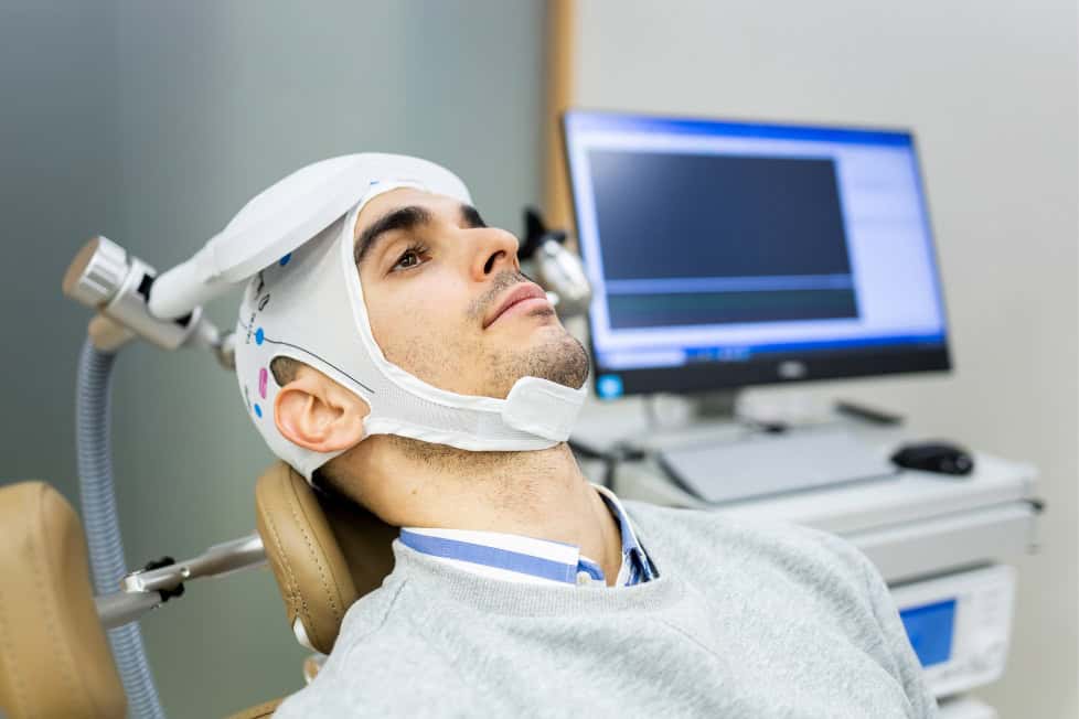 A man enjoys TMS therapy after learning about tms providers near me.