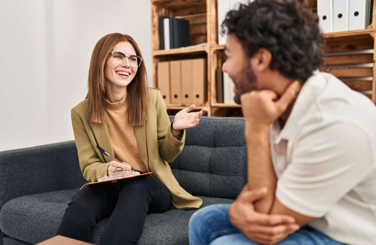 A man enjoys aftercare services after completing TMS for anxiety.