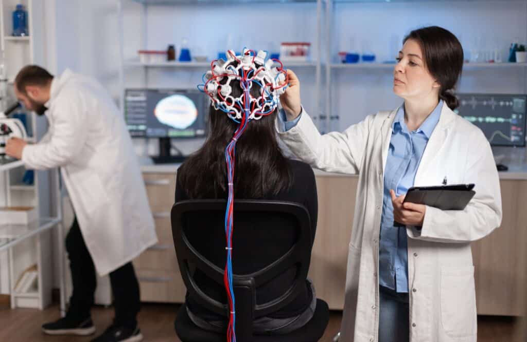 A woman enjoys treatment through TMS for anxiety.