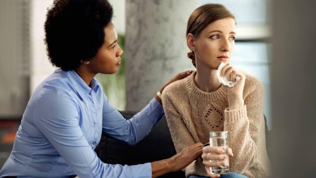 Therapist providing support for woman in treatment resistant depression treatment in Portland.