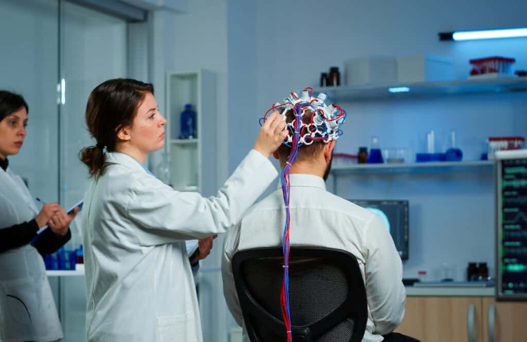 A man enjoys TMS therapy after learning about the benefits of TMS and neuroplasticity.