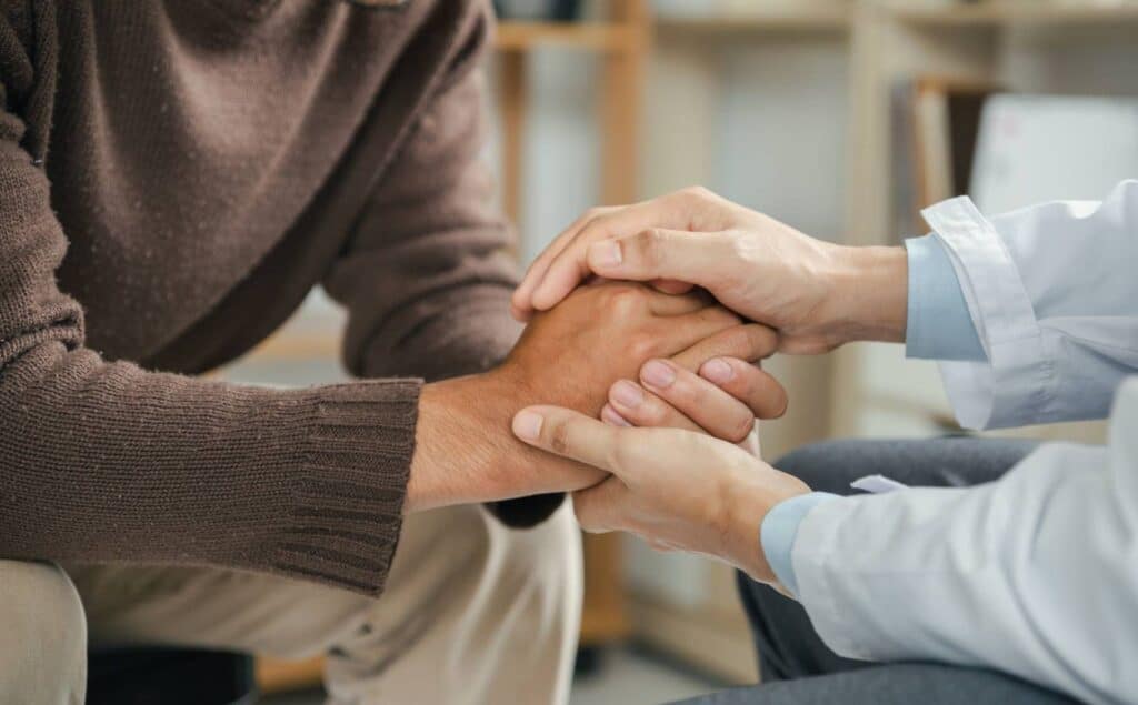 Man receiving guidance for TRICARE TMS in Portland.